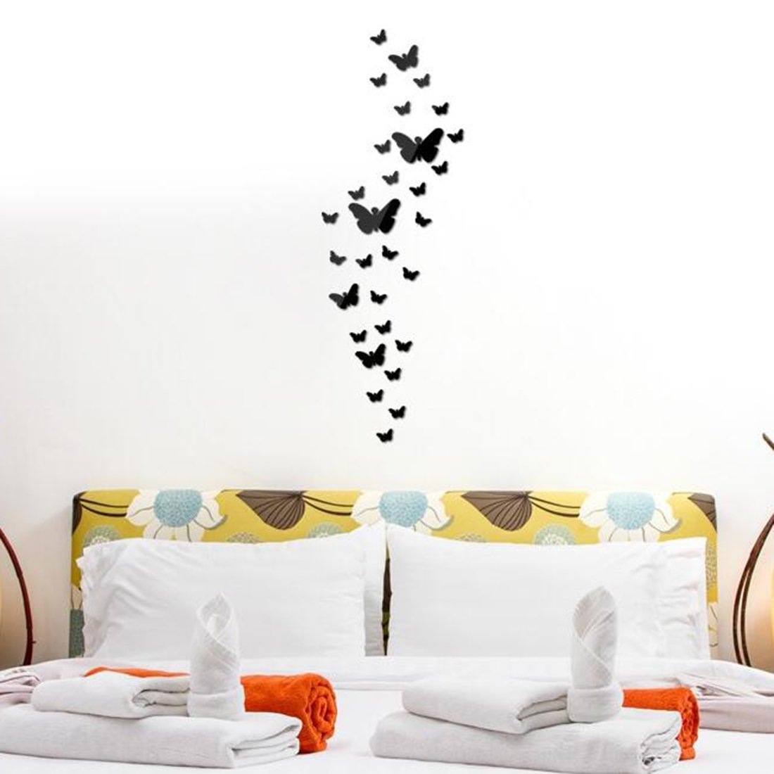 Бабочки из виниловой пленки над кроватью