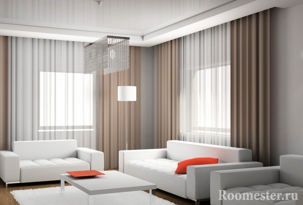 Строгий стиль комнаты с ярко-красными элементами декора
