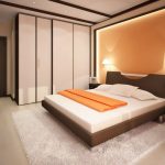 Бело-оранжевый интерьер спальни