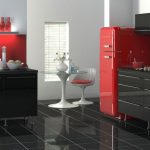 Красный холодильник и серая мебель на кухне