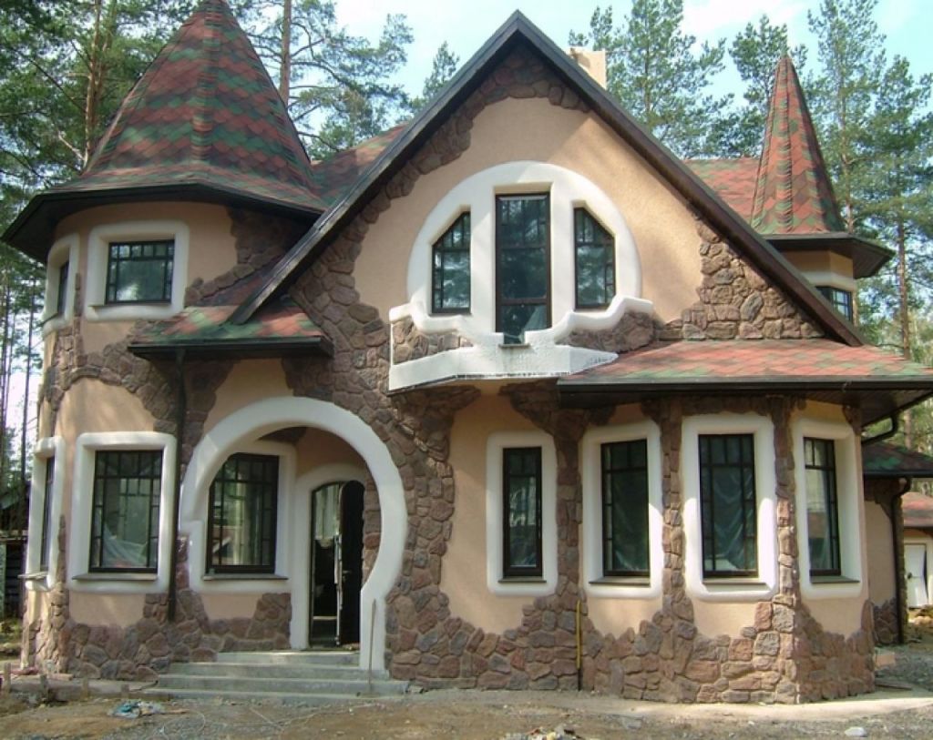 Отделка фасада дома декоративным камнем